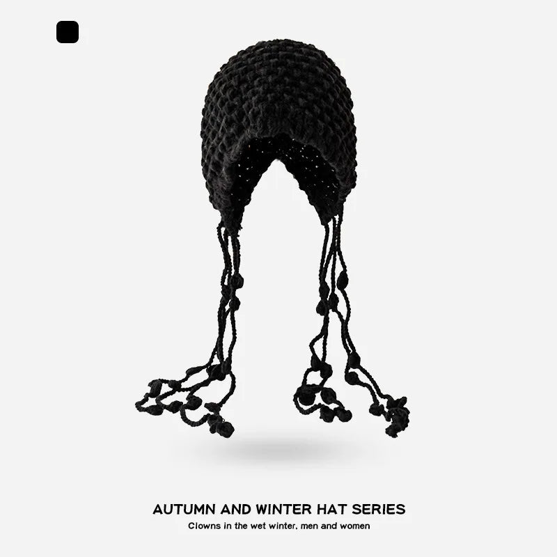 Autumn and Winter Warm Wool Hat Hand-woven Hollow Bag Hat Women's Ethnic Style Fringed Ear Protector Knitted Hat