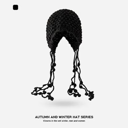 Autumn and Winter Warm Wool Hat Hand-woven Hollow Bag Hat Women's Ethnic Style Fringed Ear Protector Knitted Hat