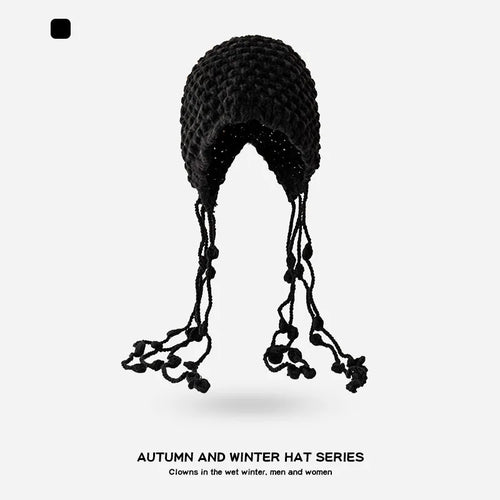 Autumn and Winter Warm Wool Hat Hand-woven Hollow Bag Hat Women's Ethnic Style Fringed Ear Protector Knitted Hat