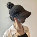 Women’s UV Protection Wide Brim Bucket Hat Foldable Ponytail Sun Hat Outdoor Beach Fisherman Cap