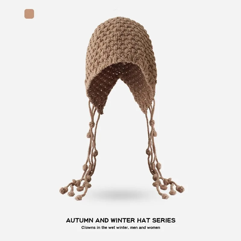 Autumn and Winter Warm Wool Hat Hand-woven Hollow Bag Hat Women's Ethnic Style Fringed Ear Protector Knitted Hat