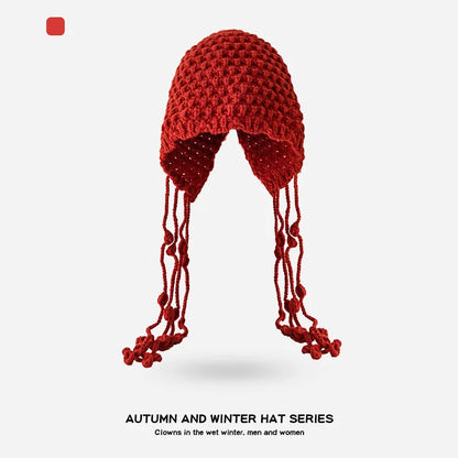 Autumn and Winter Warm Wool Hat Hand-woven Hollow Bag Hat Women's Ethnic Style Fringed Ear Protector Knitted Hat